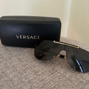 Versace Women's Sunglasses with Black and Gold Accents